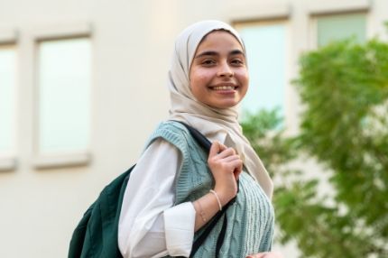 Happy student on campus
