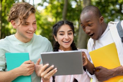 International students excited by news on tablet