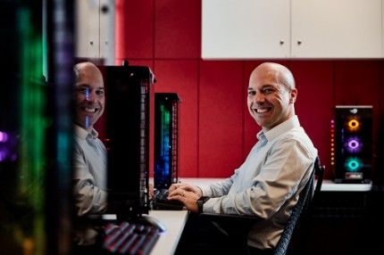 Man happy working in office