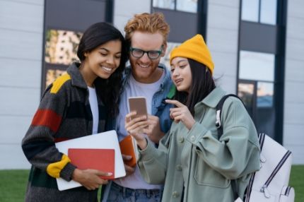 Students looking at phone