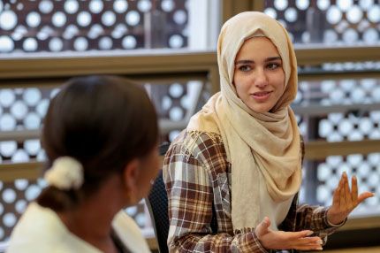 Two women having conversation