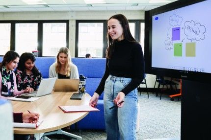 Woman leading meeting