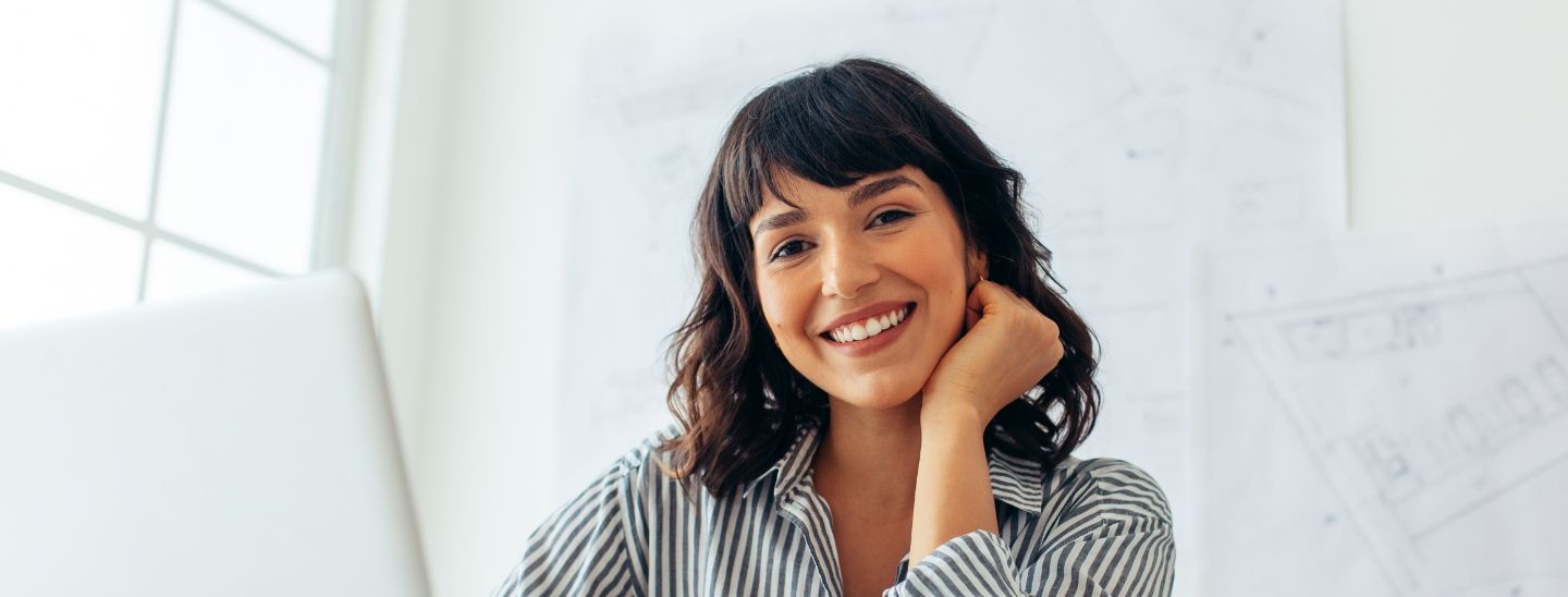 Woman smiling happy working