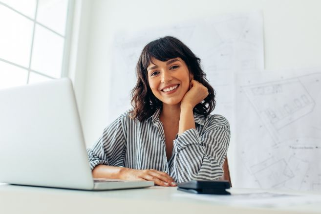 Woman smiling happy working